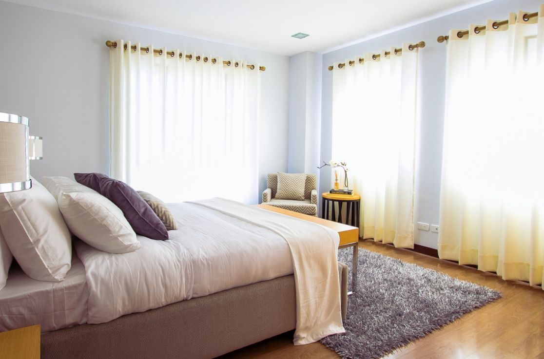 White Bed Comforter and Curtain — Custom Window Furnishings in Wagga Wagga, NSW