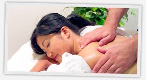 Sports injury - Bath, Trowbridge, Chippenham, Bristol  -  St Michaels Chiropractic Clinic  - Lady having a massage