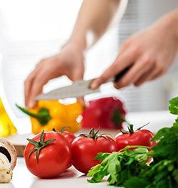 Catering Services — Chef Cutting Vegetables in Long Island City, NY