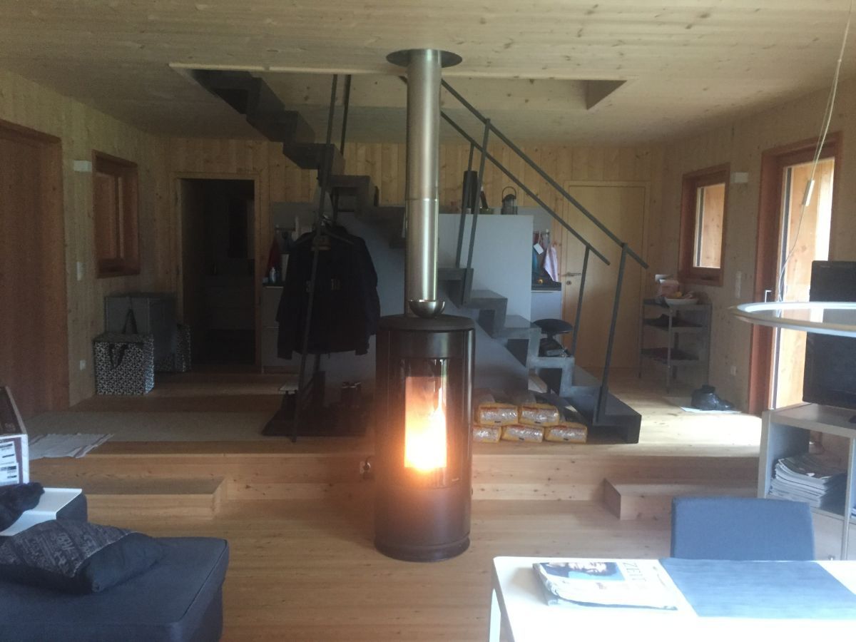 Casa con stufa a legna