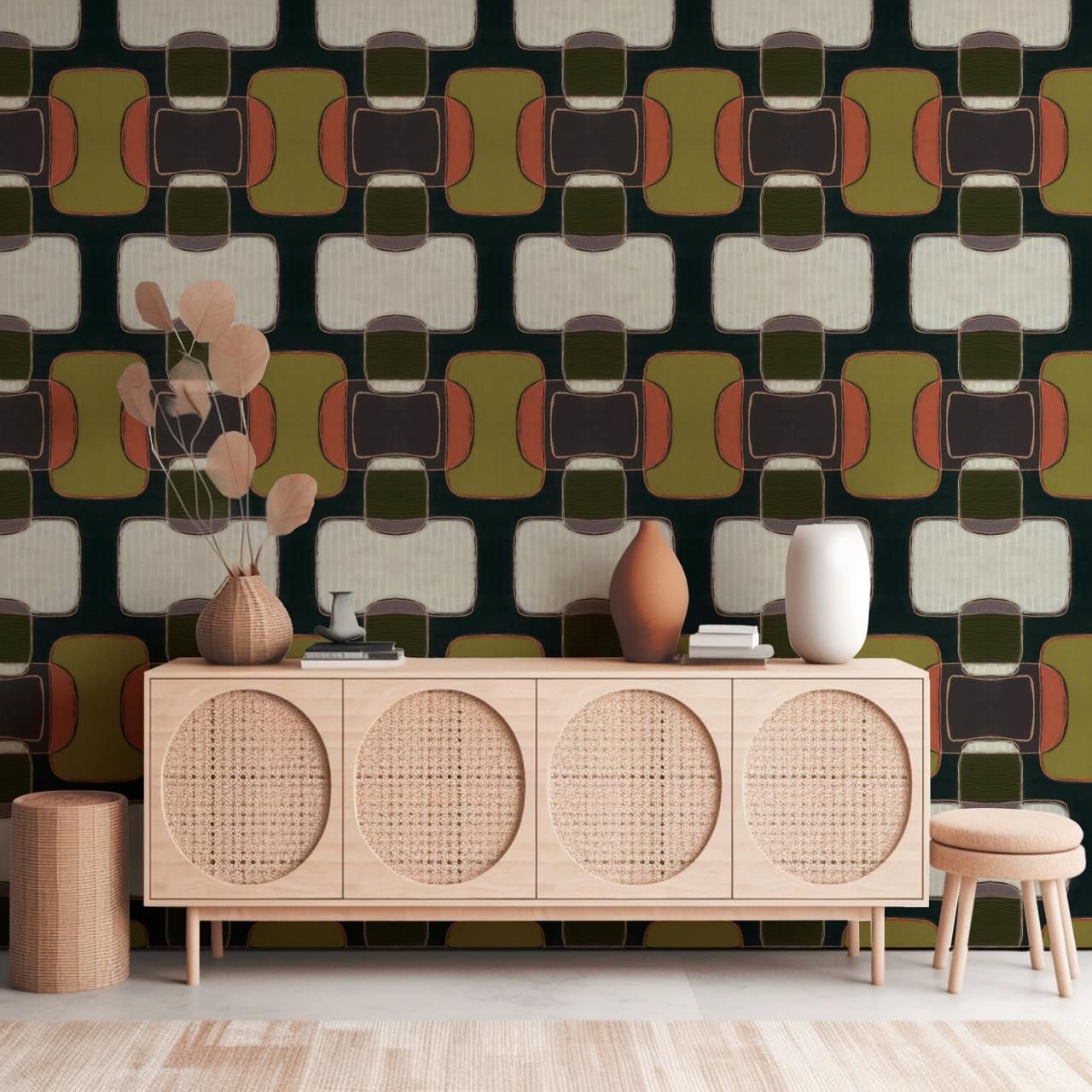 A folded fabric with a geometric grid pattern featuring rows of white rectangles and olive-green shapes on a black base.