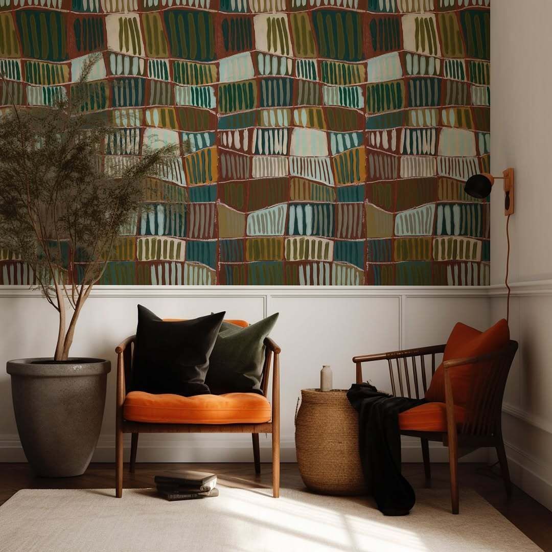 A grid-like textile pattern featuring textured, rectangular blocks in varying shades of teal, brown, olive, and cream.