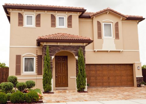 House with White Garage Door — Cocoa, FL — Freedom Garage Doors