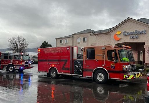 Fire trucks parked outside a Camp Verde hotel