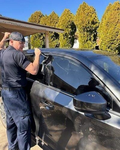 VVFD personnel attempts to unlock a car with a child inside