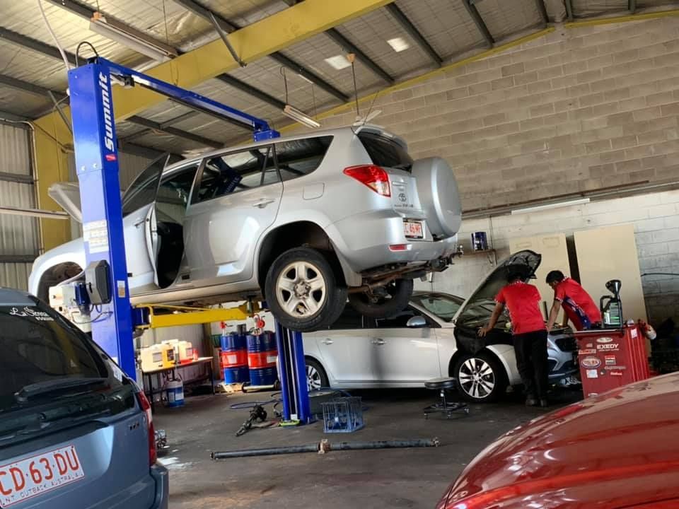 A Car is Sitting on a Lift in a Garage — JDM Mechanical & Aircon Repairs In Coconut Grove, NT