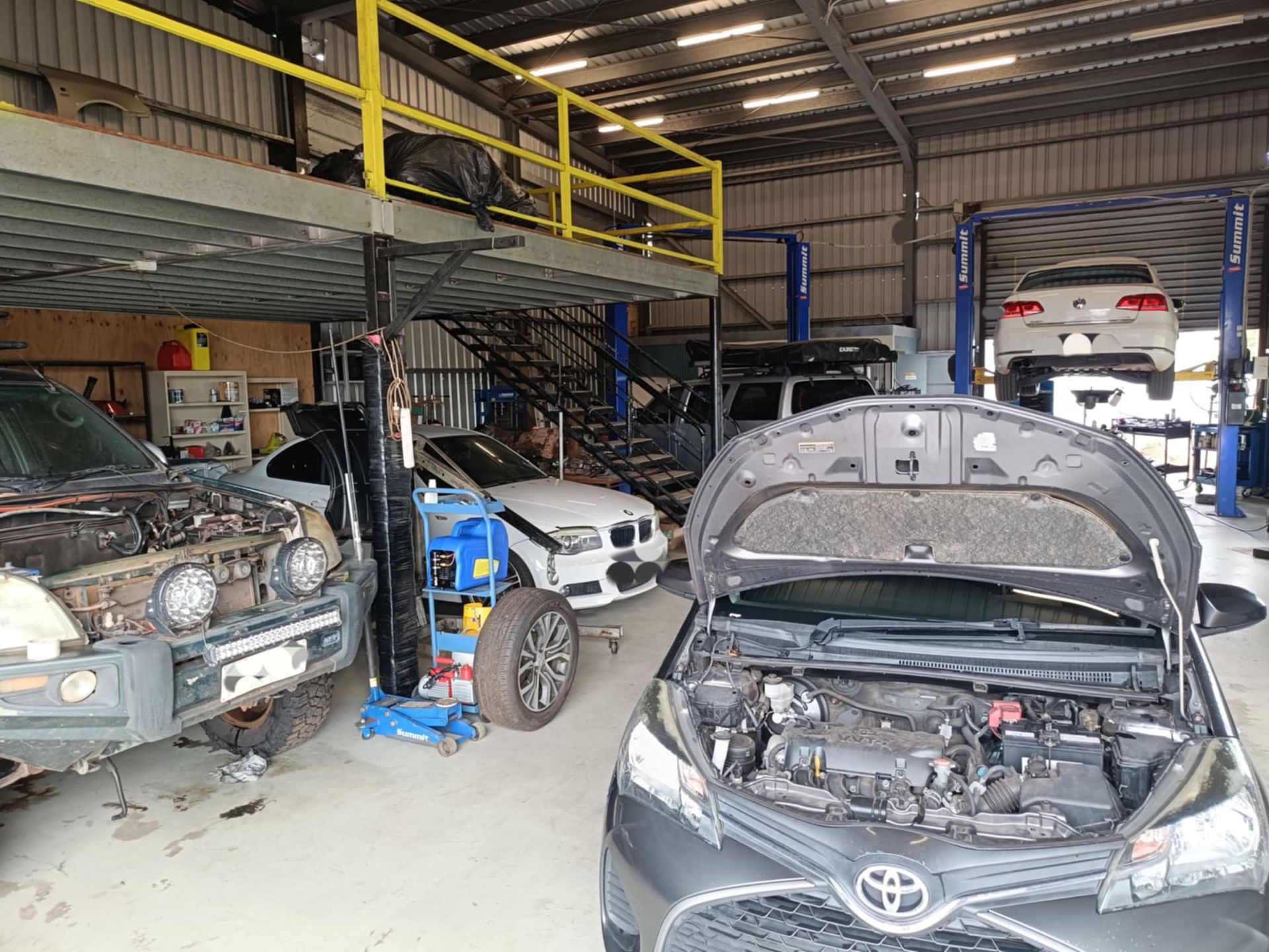 A Car in a Garage With the Hood Open — JDM Mechanical & Aircon Repairs In Coconut Grove, NT