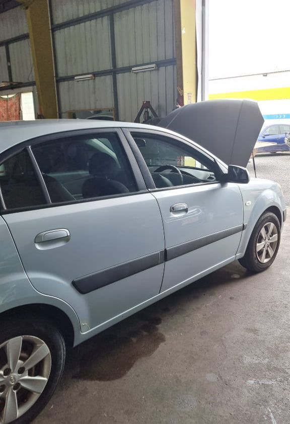 A White Car With the Hood Up is Parked in a Garage — JDM Mechanical & Aircon Repairs In Coconut Grove, NT