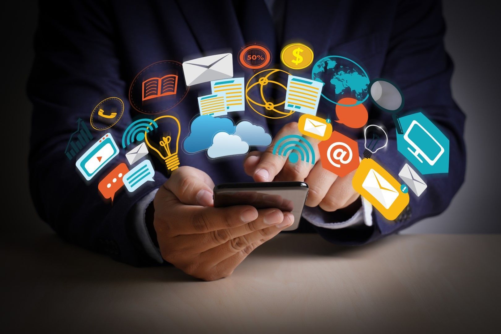 Person in suit using a smartphone with digital icons representing apps and online services.