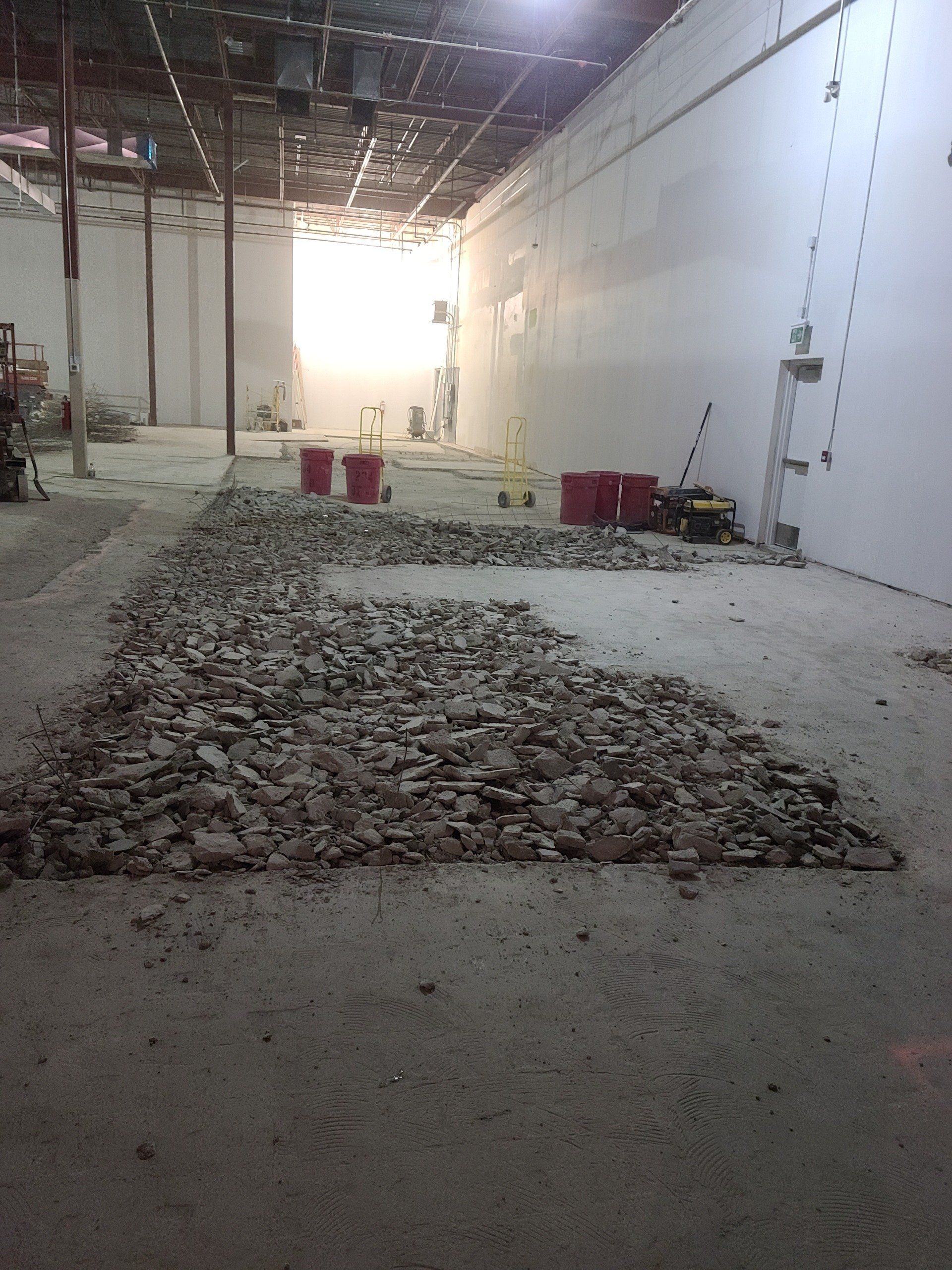 A large room with a lot of rocks on the floor