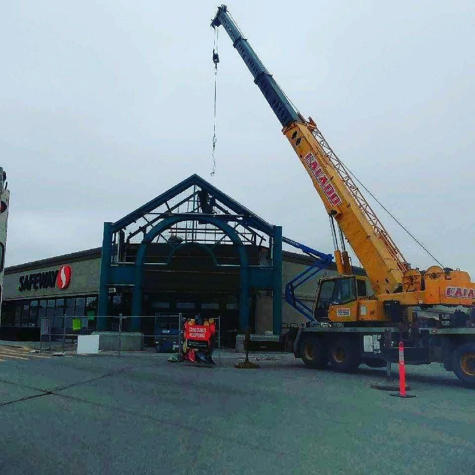 A large yellow crane with the word easy on it