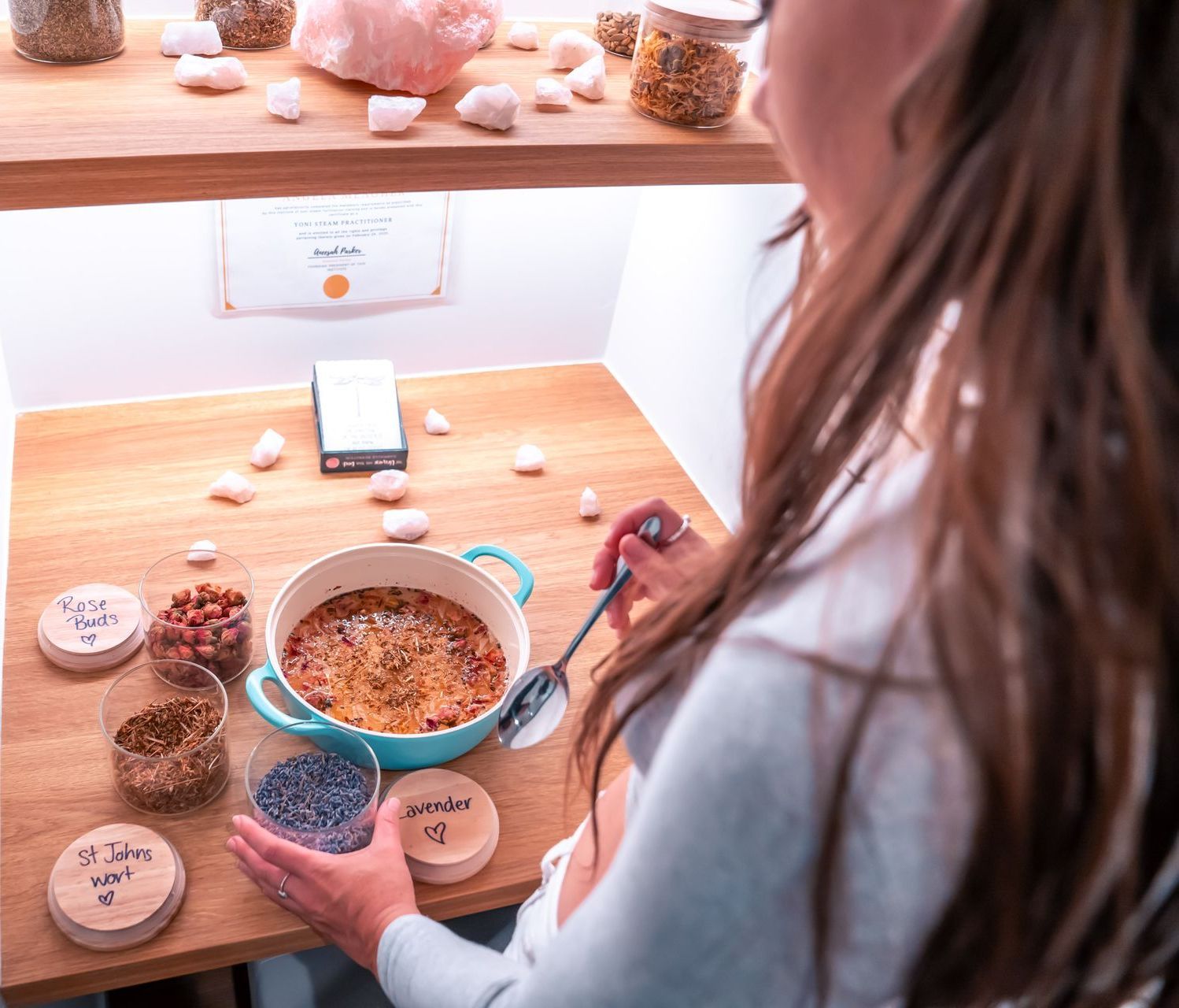 A Woman and a Table With a Bowl of Food and a Spoon — Yoni Steam Australia in Gold Coast, QLD