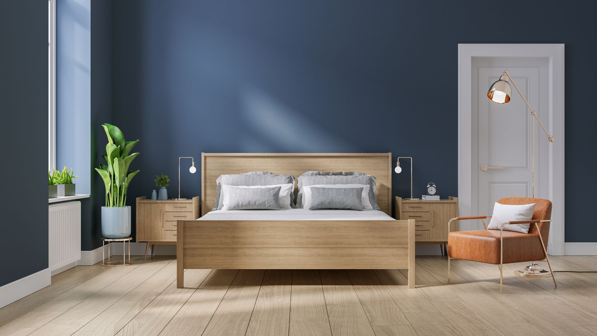 Modern bedroom with blue walls, wooden bed, nightstands, chair, and large window.