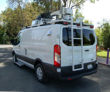 Action News 5 - Two of our three microwave live trucks, plus an engineering  van on the far right.