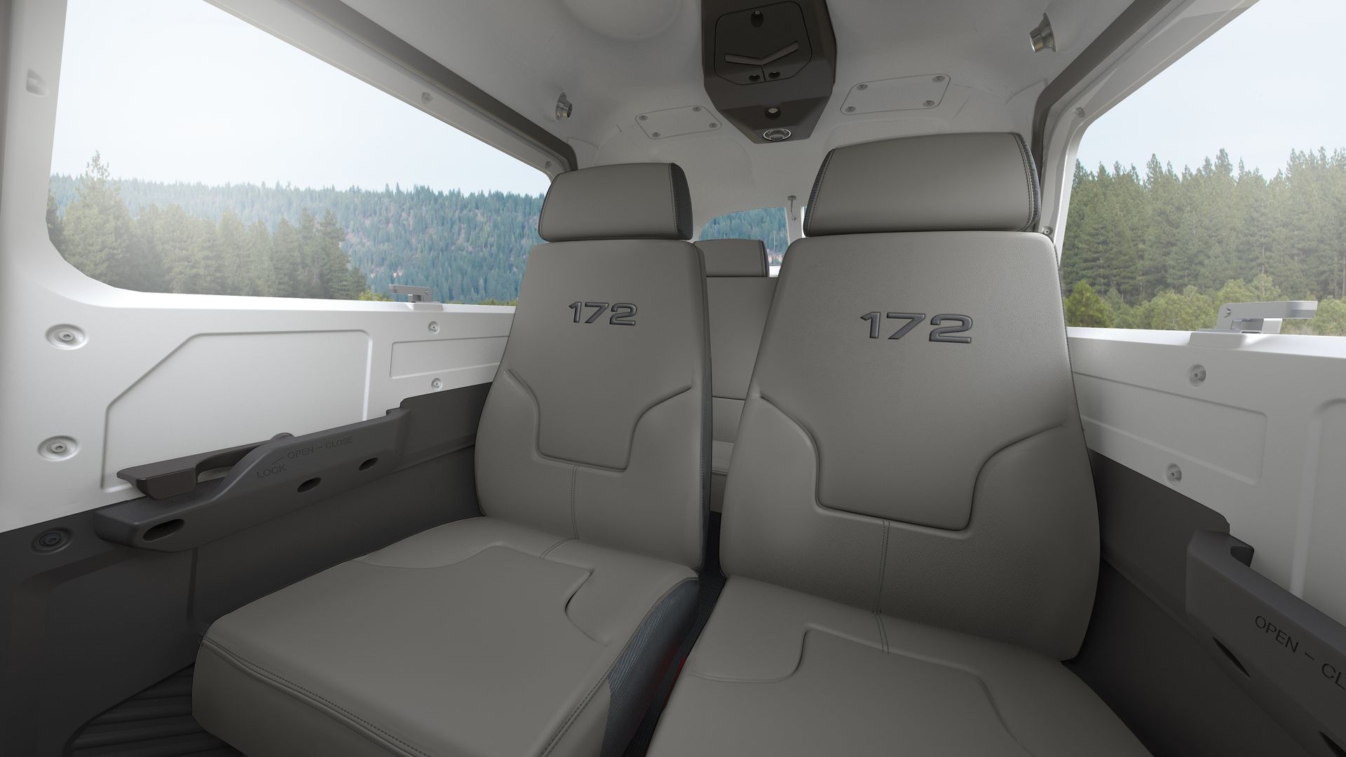 The interior of a plane with the number 172 on the seats.