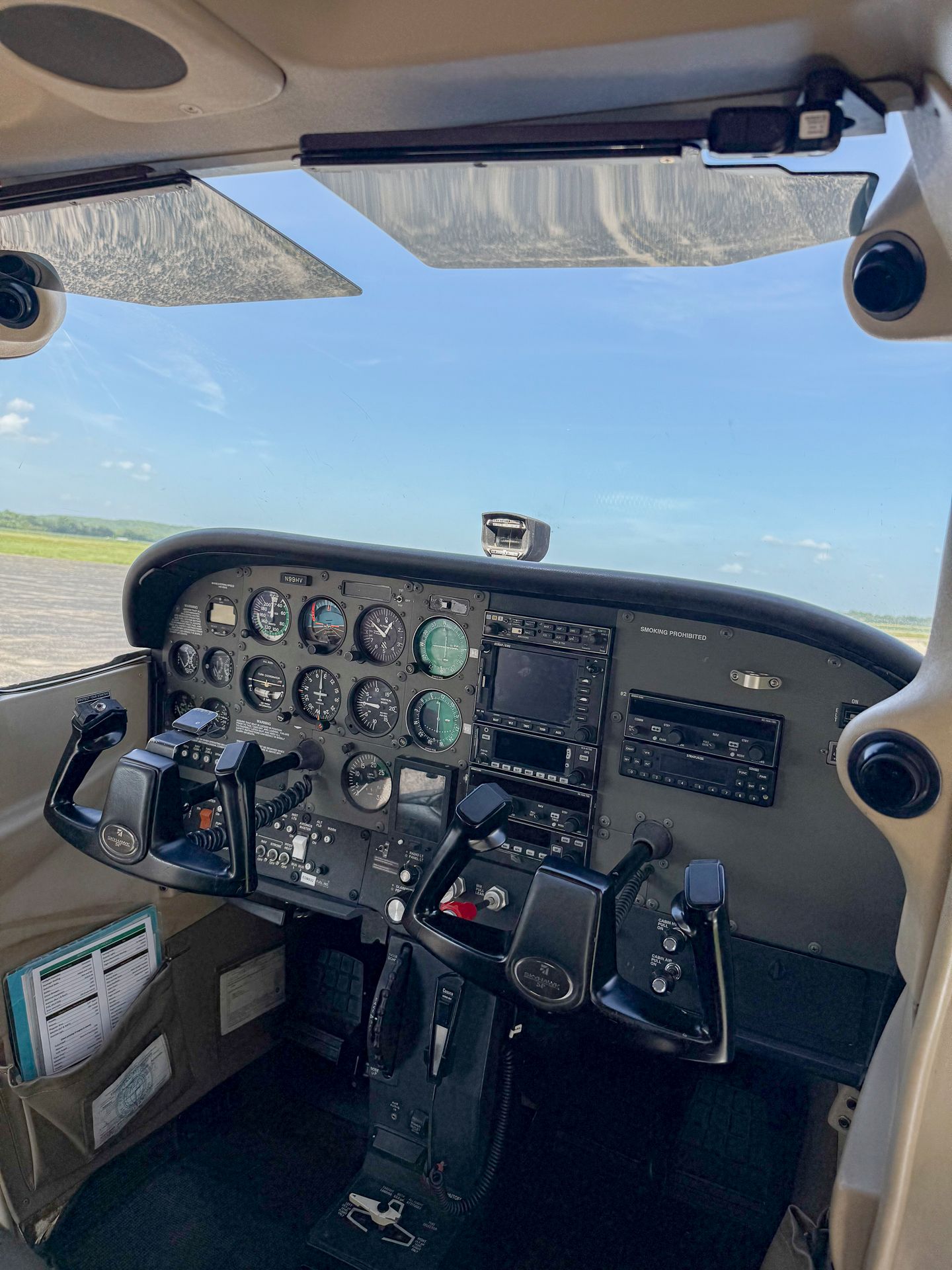 inside the cockpit of a Cessna by Hetrick air service Kansas