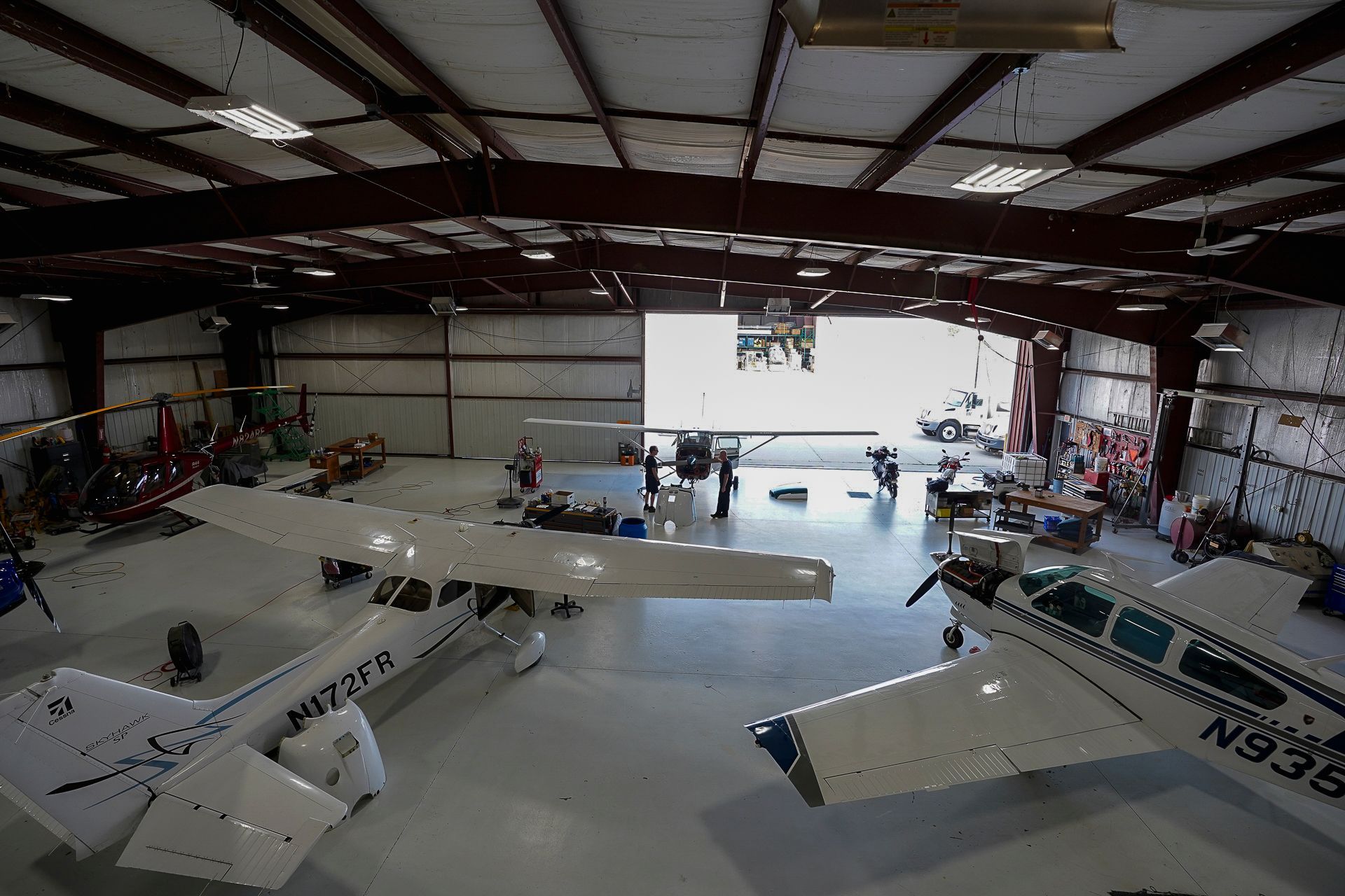A plane in a hangar with the number n9388y on it