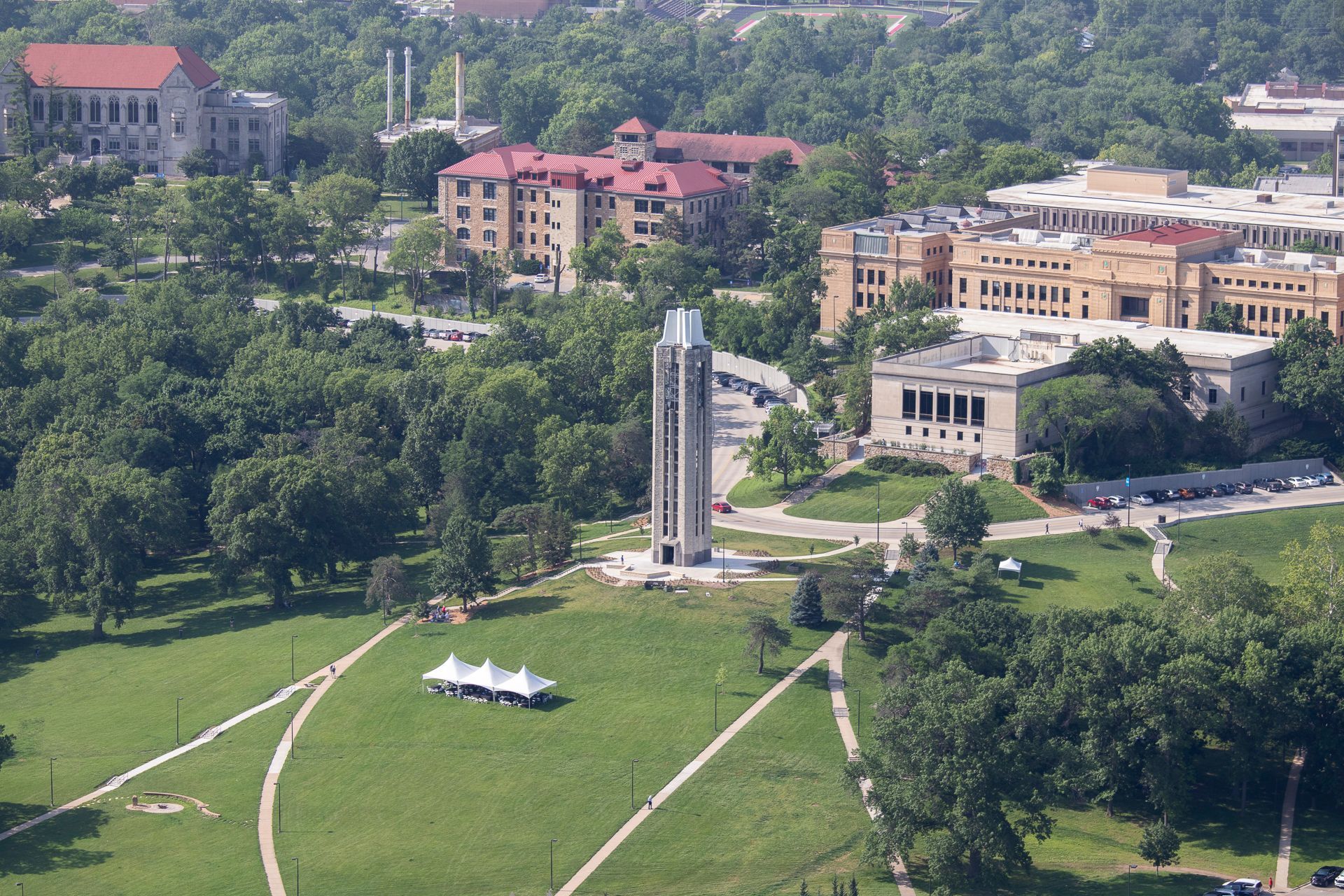 An aerial view of a city with lots of buildings and trees