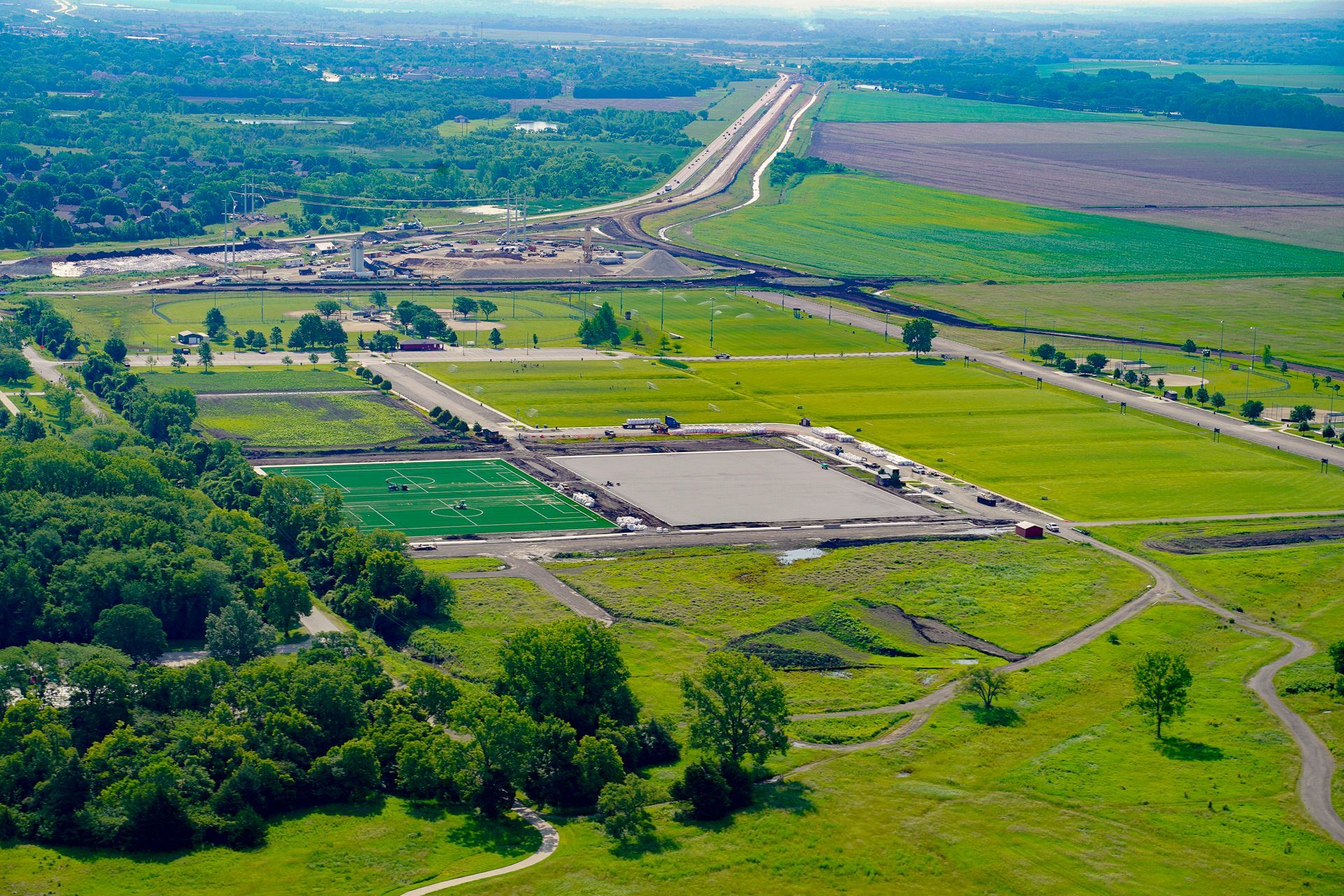 K 10 Highway Aerial Photography by Hetrick Air Service Lawrence with green grass and clear sky