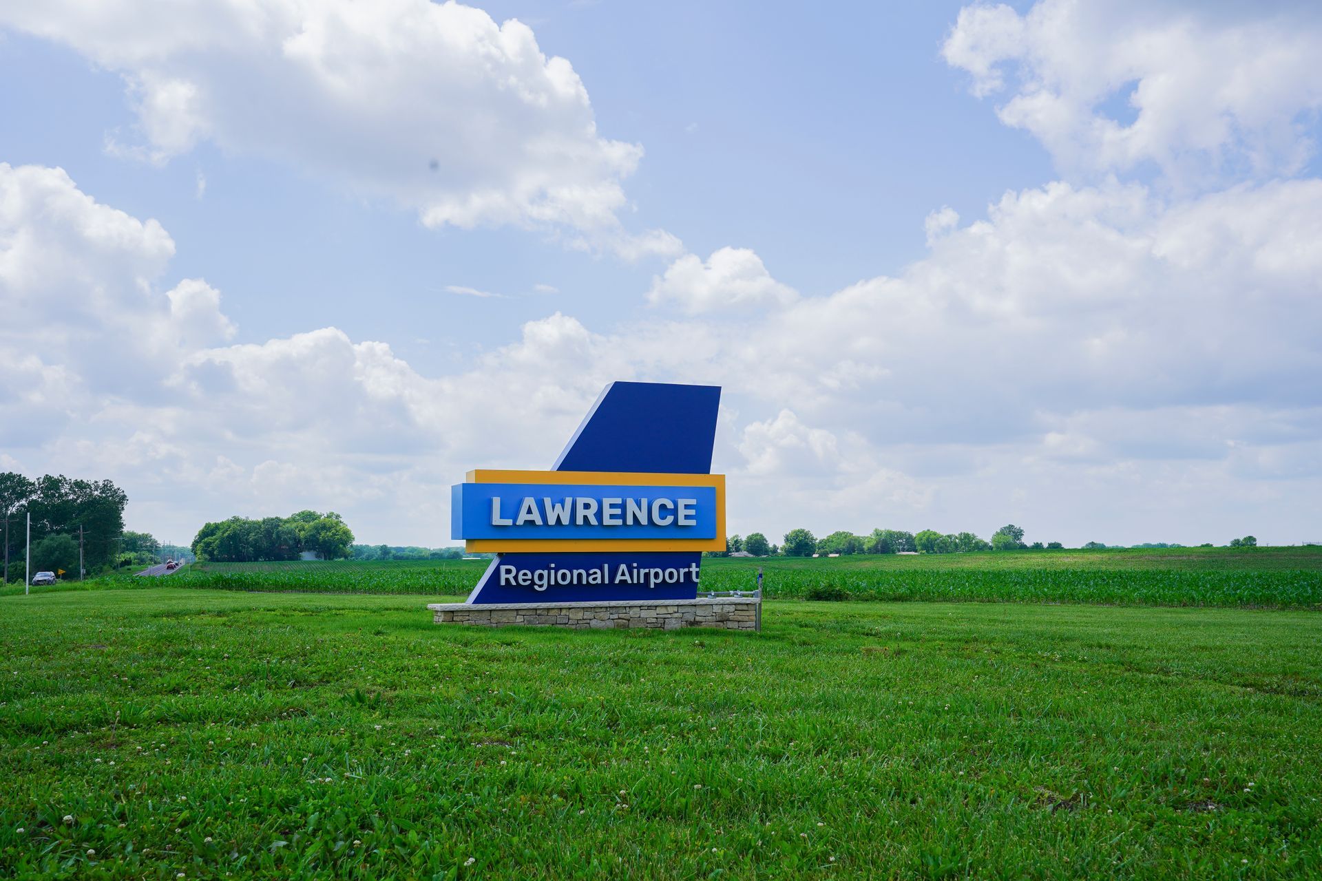 A small airplane is parked on the tarmac of an airport.