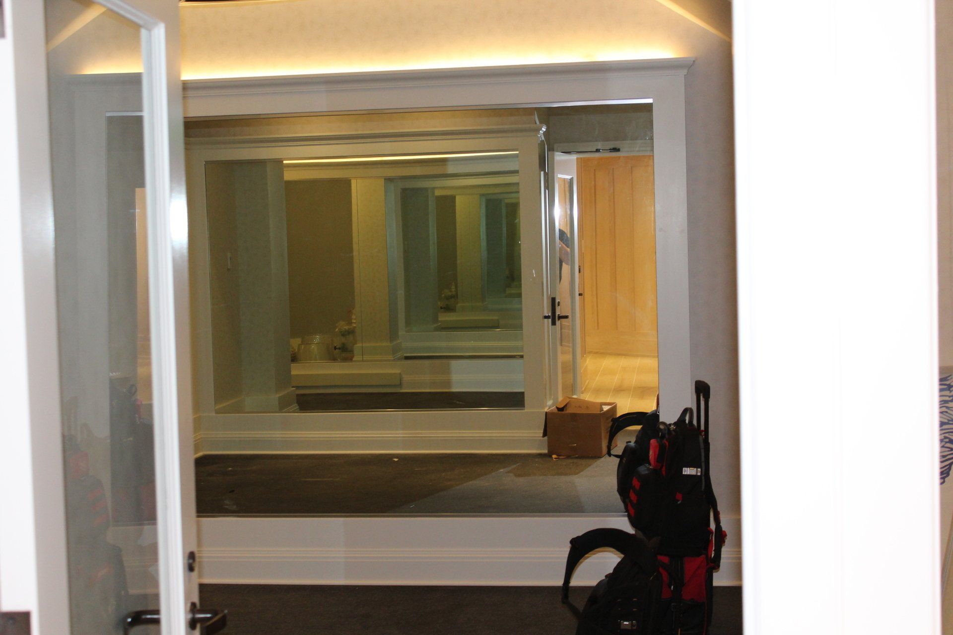 Renovated fitness area at The Reeds at Shelter Haven with large wall mirrors