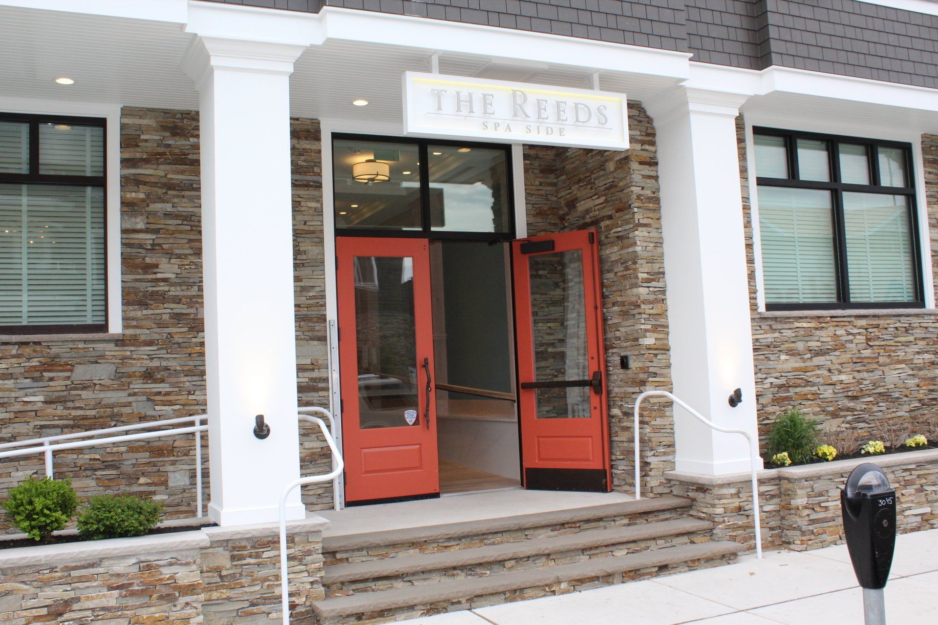 Entrance of The Reeds at Shelter Haven with open double doors.