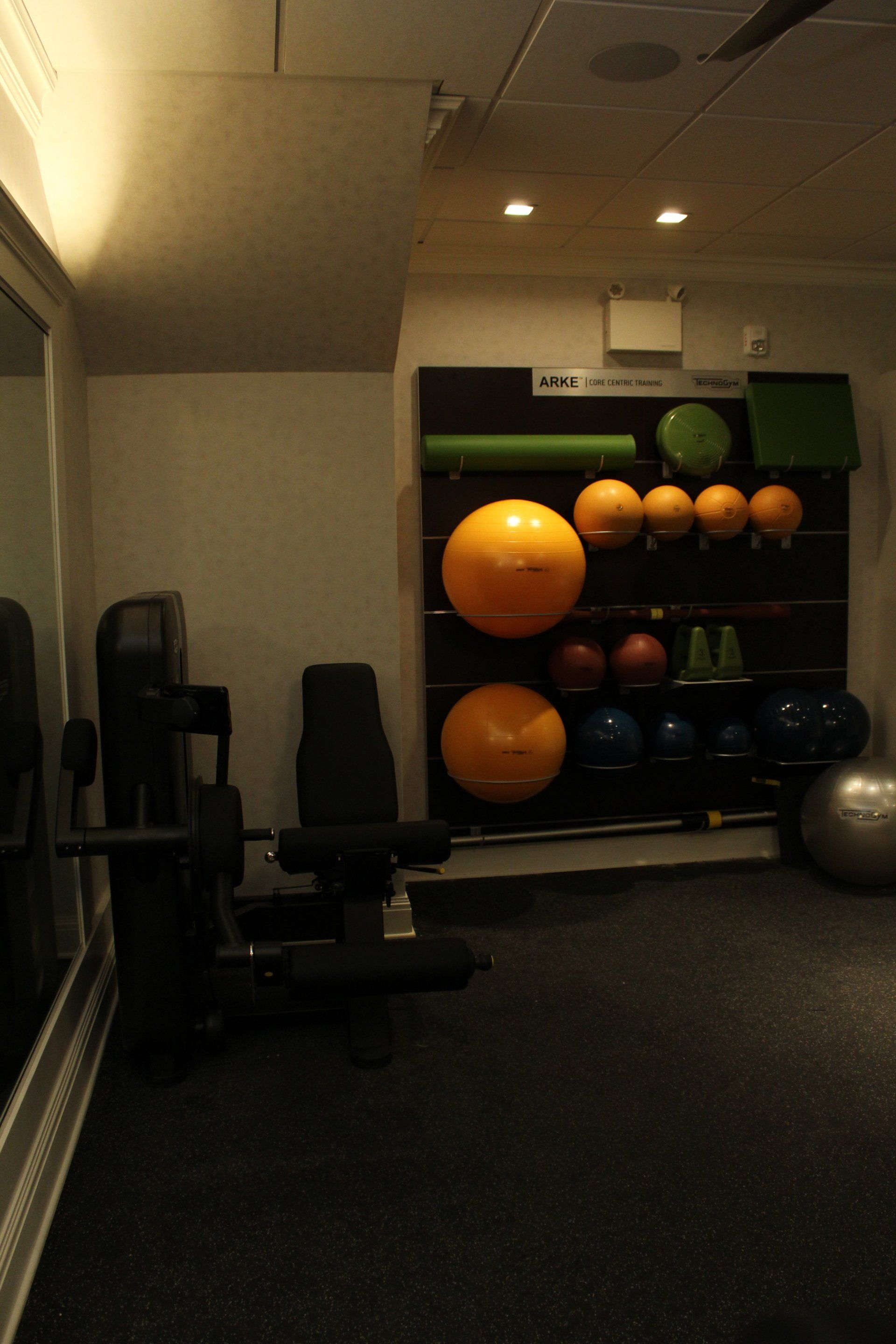 Assorted exercise balls and gym seating in the fitness area at The Reeds at Shelter Haven.