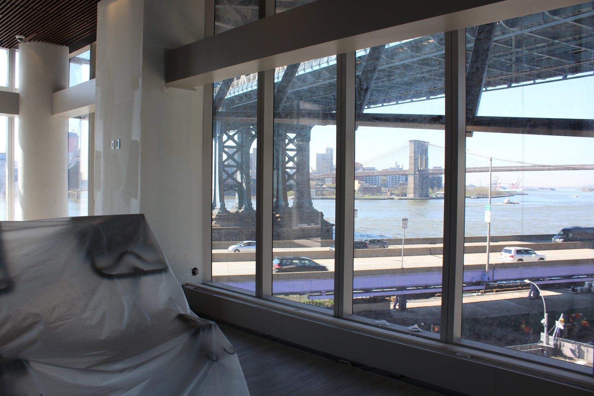 Lounge area with river view at One Manhattan Square.