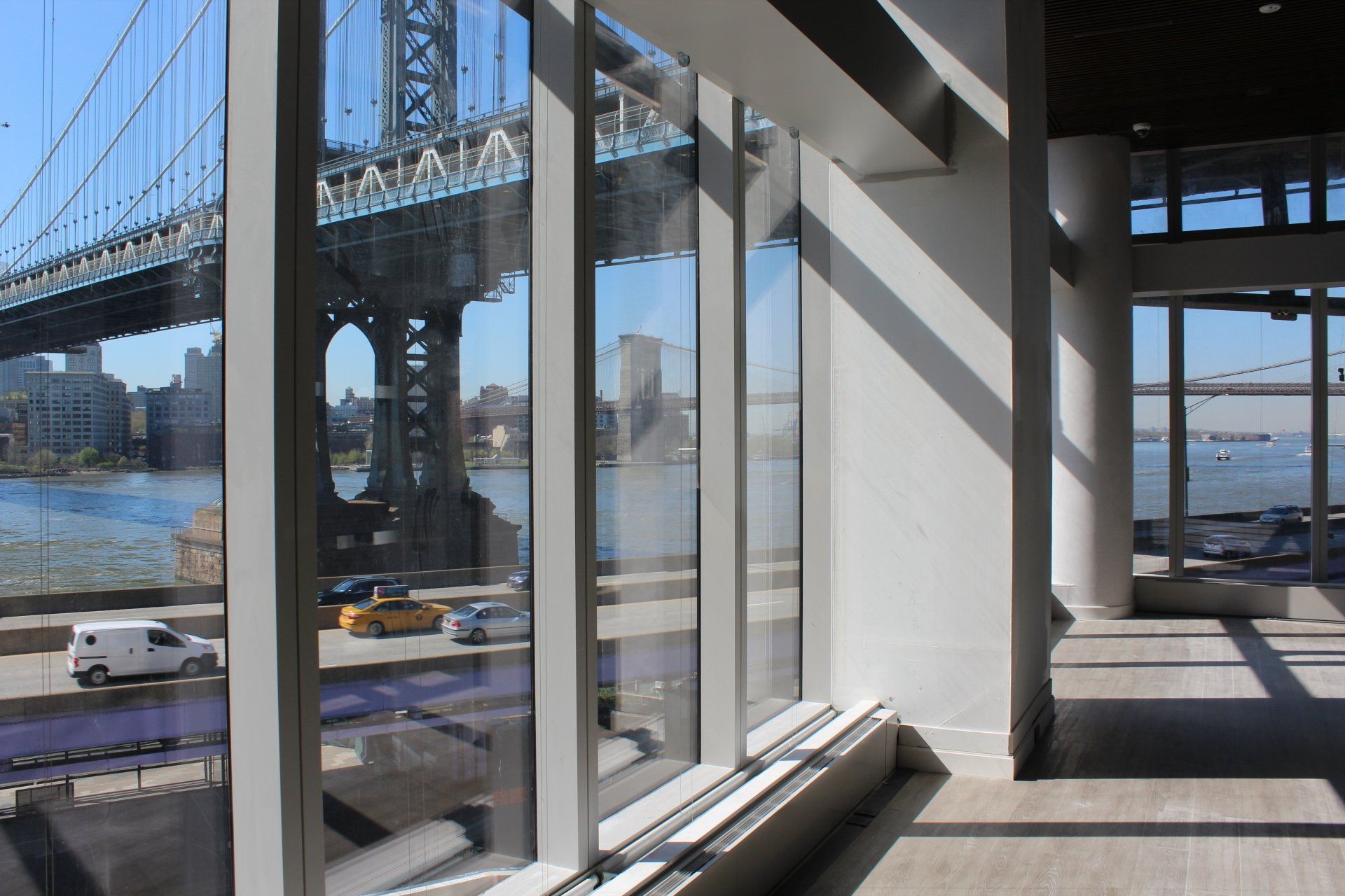 Scenic riverfront view from One Manhattan Square windows.