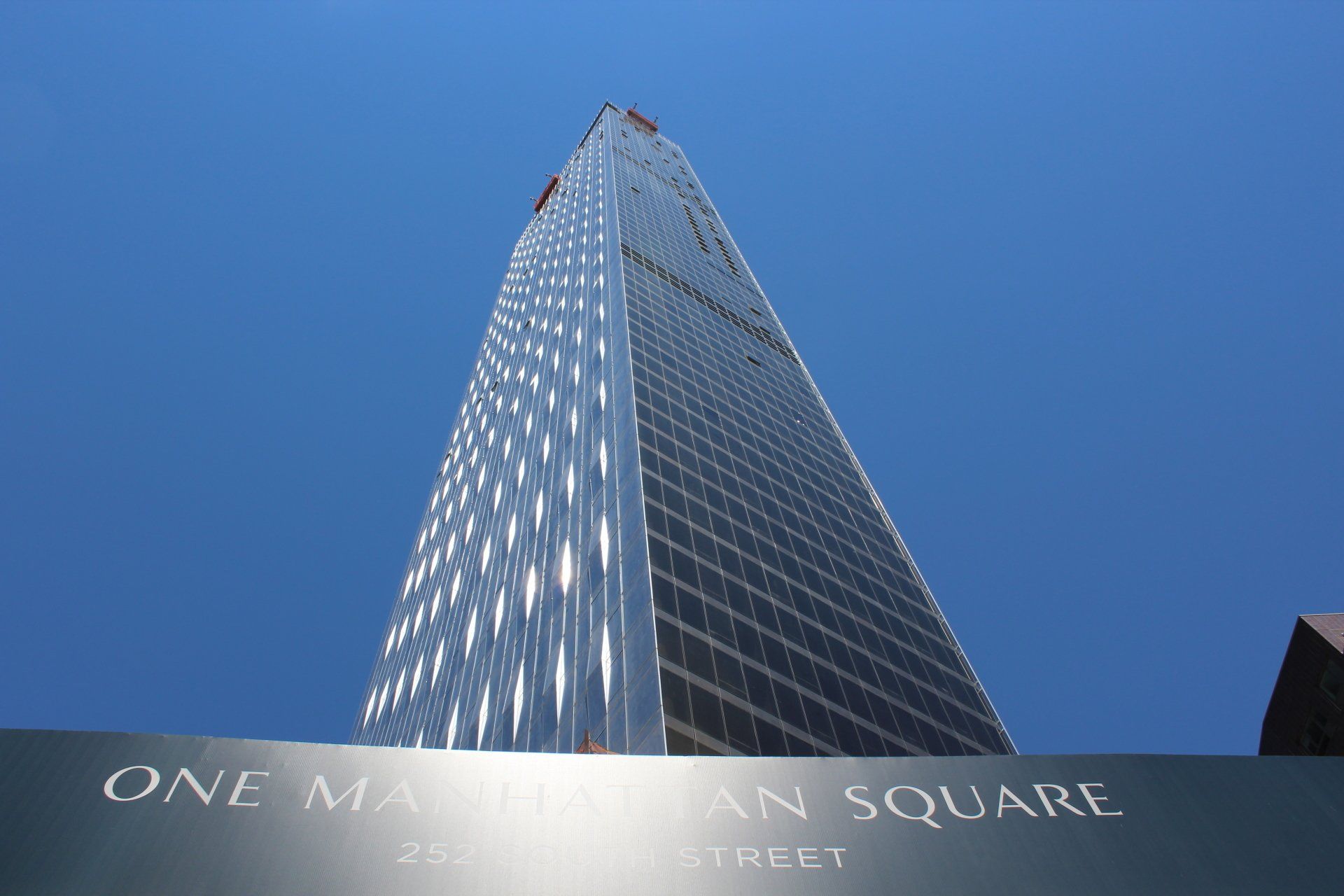 Skyscraper view of One Manhattan Square luxury high-rise.