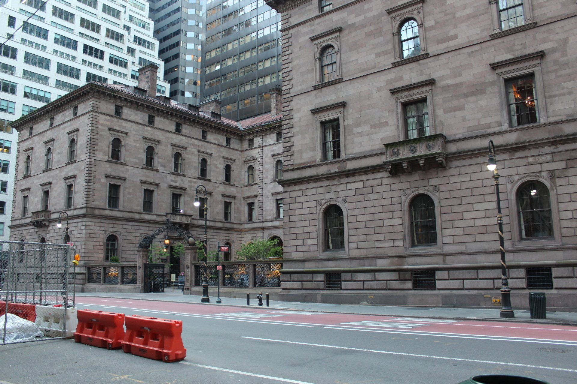 Exterior view of Lotte New York Palace hotel and nearby city buildings