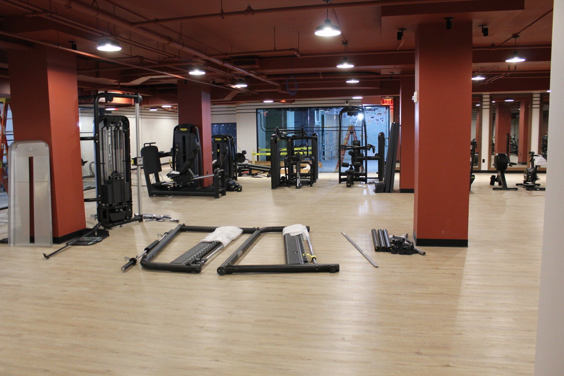 Fitness machines arranged in a modern gym at Twenty Exchange Place, New York.