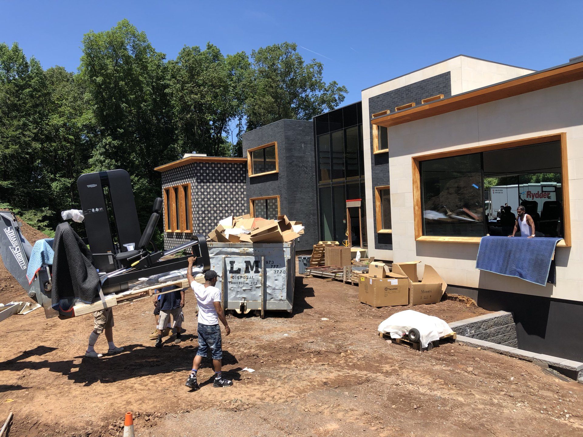 Residential build in Bernardsville with active construction site and crew.