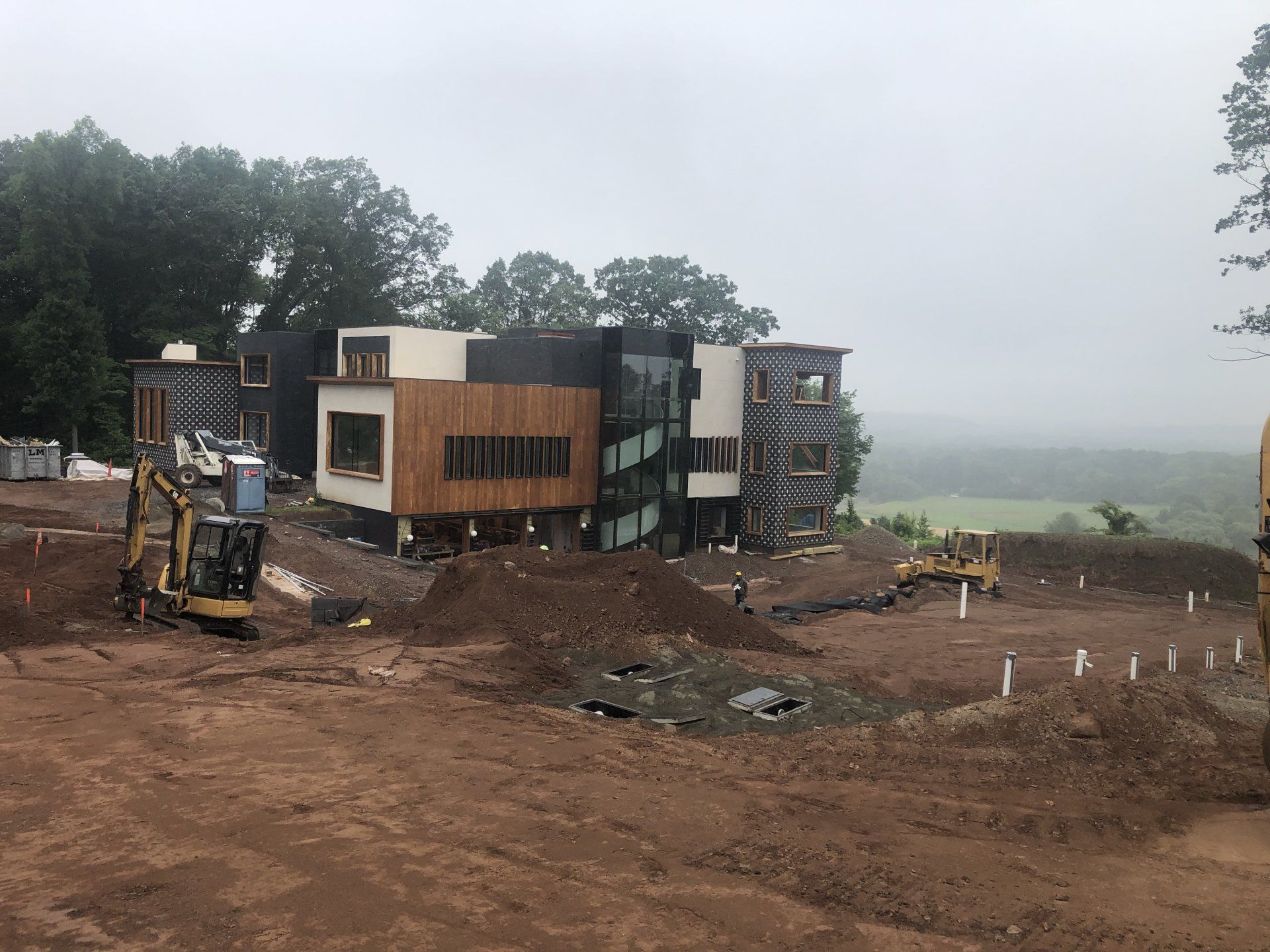 Contemporary Bernardsville home construction with open landscape views