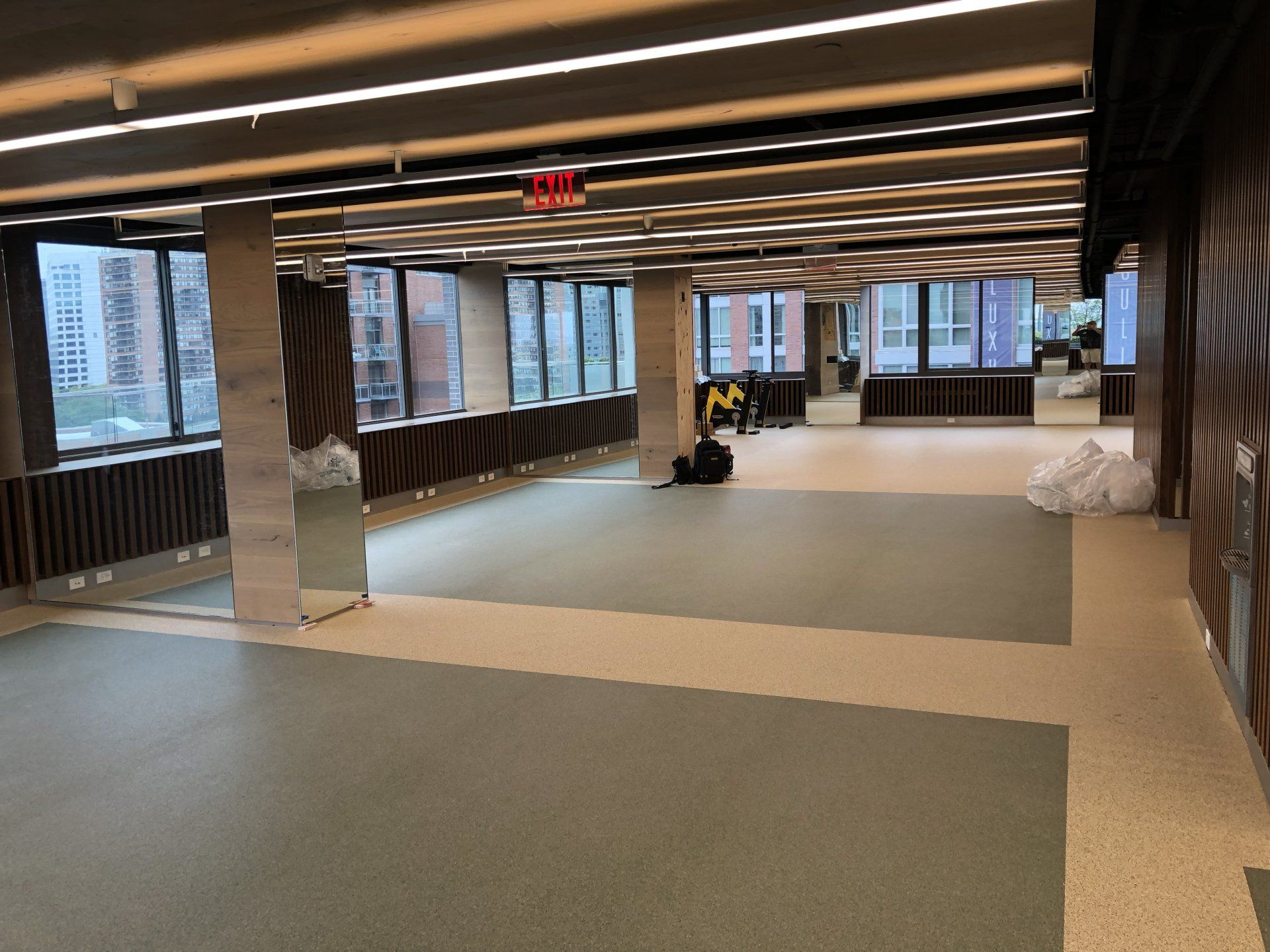 Open workout studio at Iron State with large windows, natural light, and open floor space.