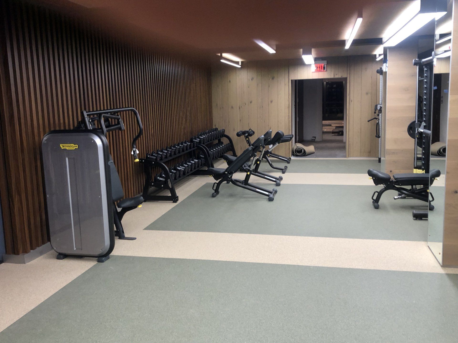 Dedicated training area with benches and equipment at Iron State gym