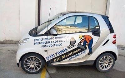 macchina della ditta specializzata in coperture edili