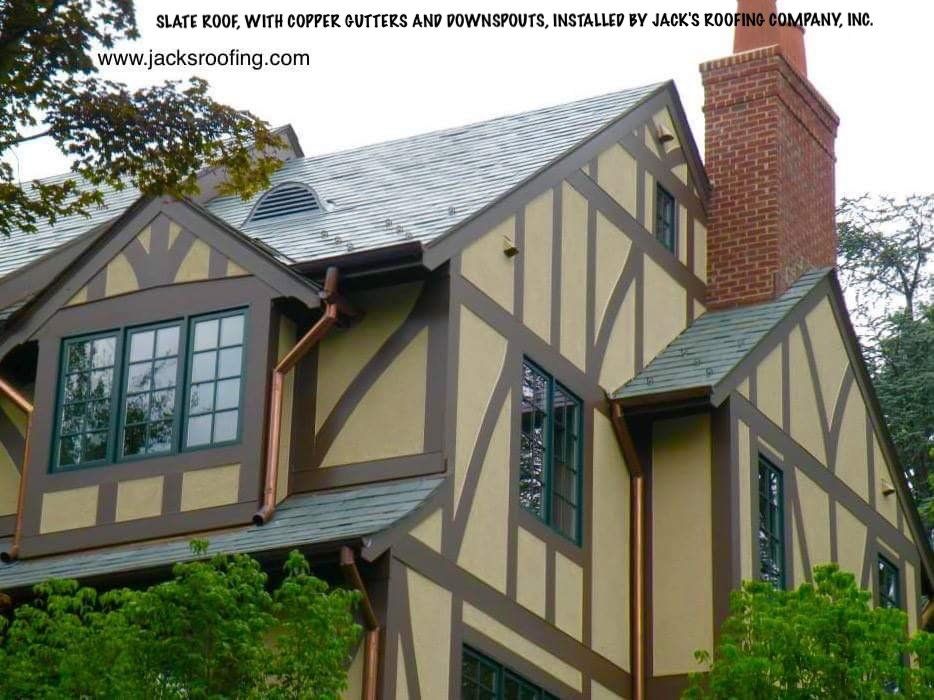Slate roof with copper gutters and copper downspouts installed by Jack's Roofing Company, Inc.