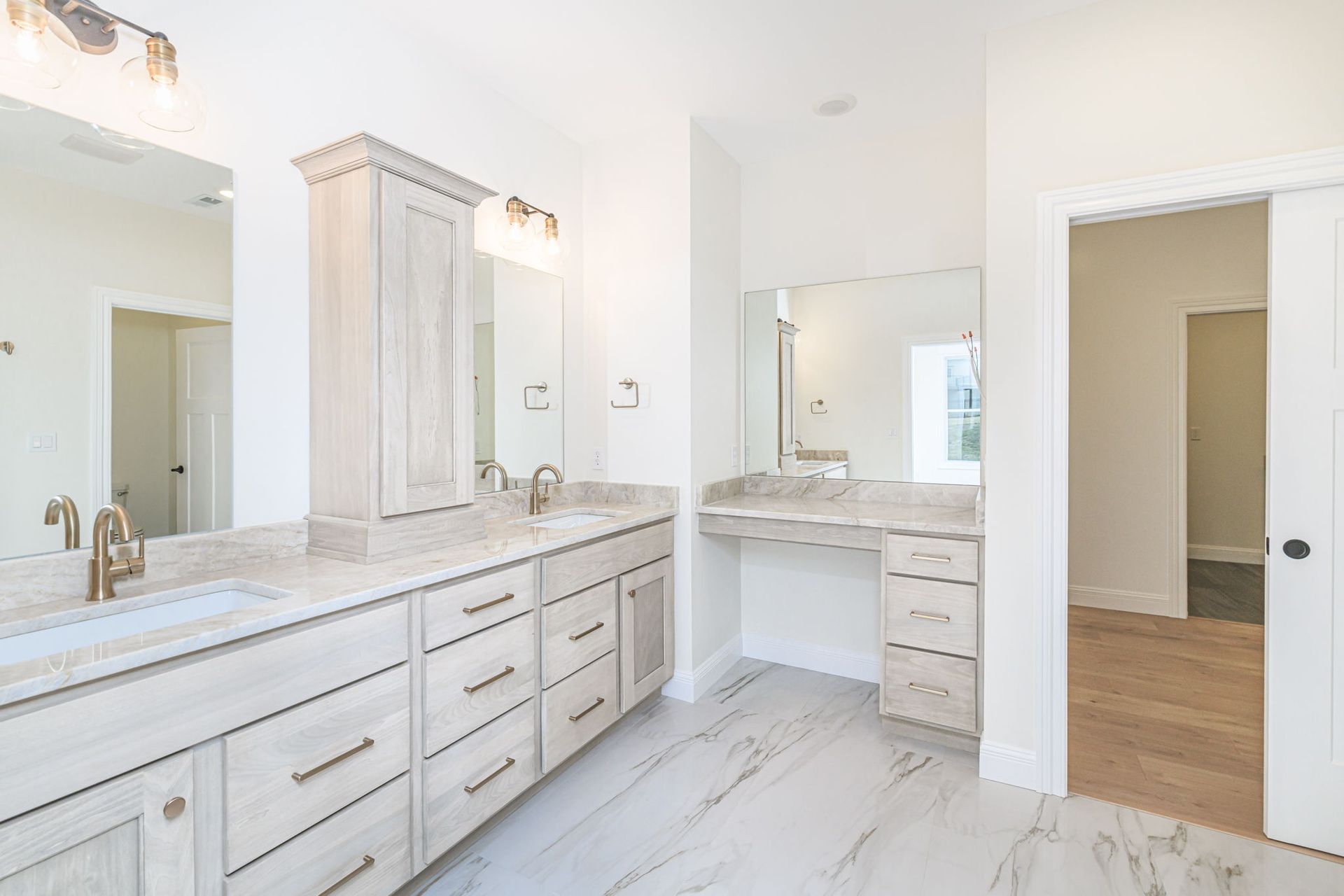 Design a More Functional Primary Bath With Lots of Custom Cabinets. Rave Homes Can Help in Mid-Mo.