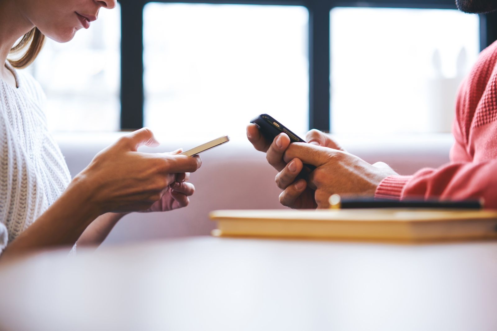 Use Home Planning Apps on Your Phone to Help Design Your Home. A Couple Holding Phones.