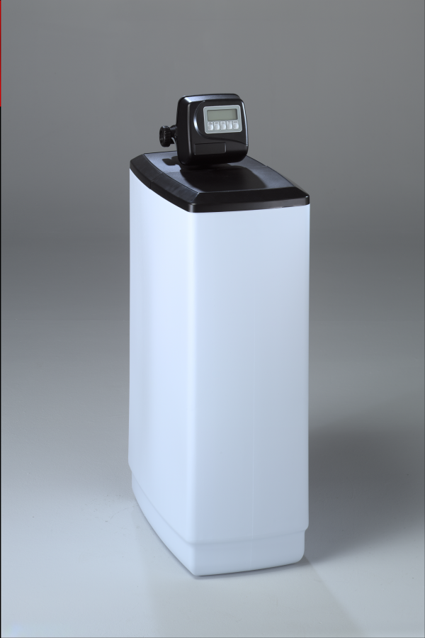 A white water softener with a digital display on top