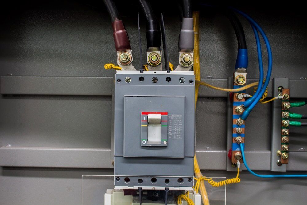 Electrical Panel With Three Black, Brown, and Gray Wires Connected — Darwin Electrical Services in Palmerston, NT