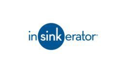 A blue and white logo for in sinkerator on a white background.