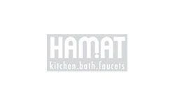 A white logo for a company called hamat kitchen bath faucets