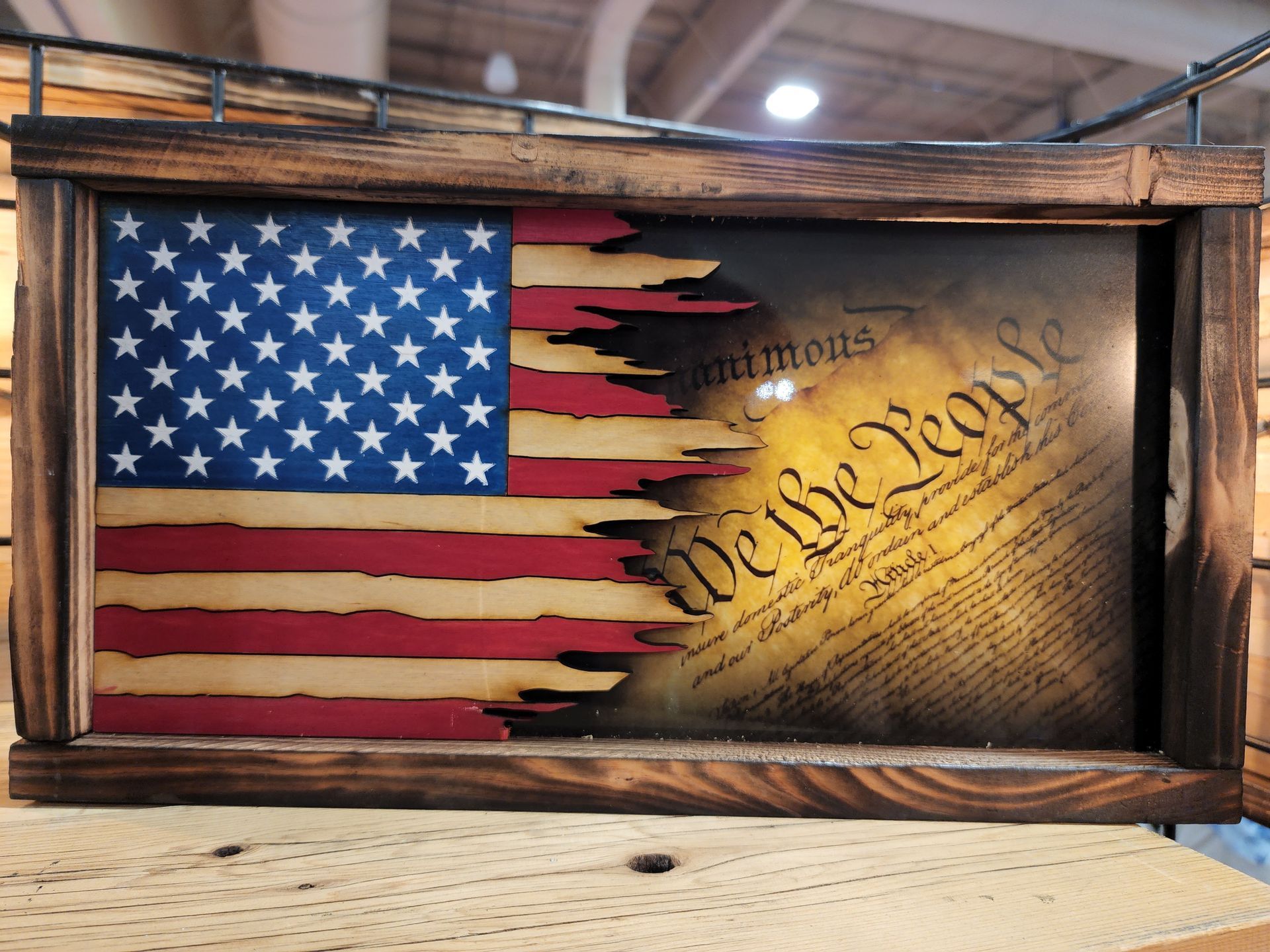 A framed american flag with the declaration of independence on it