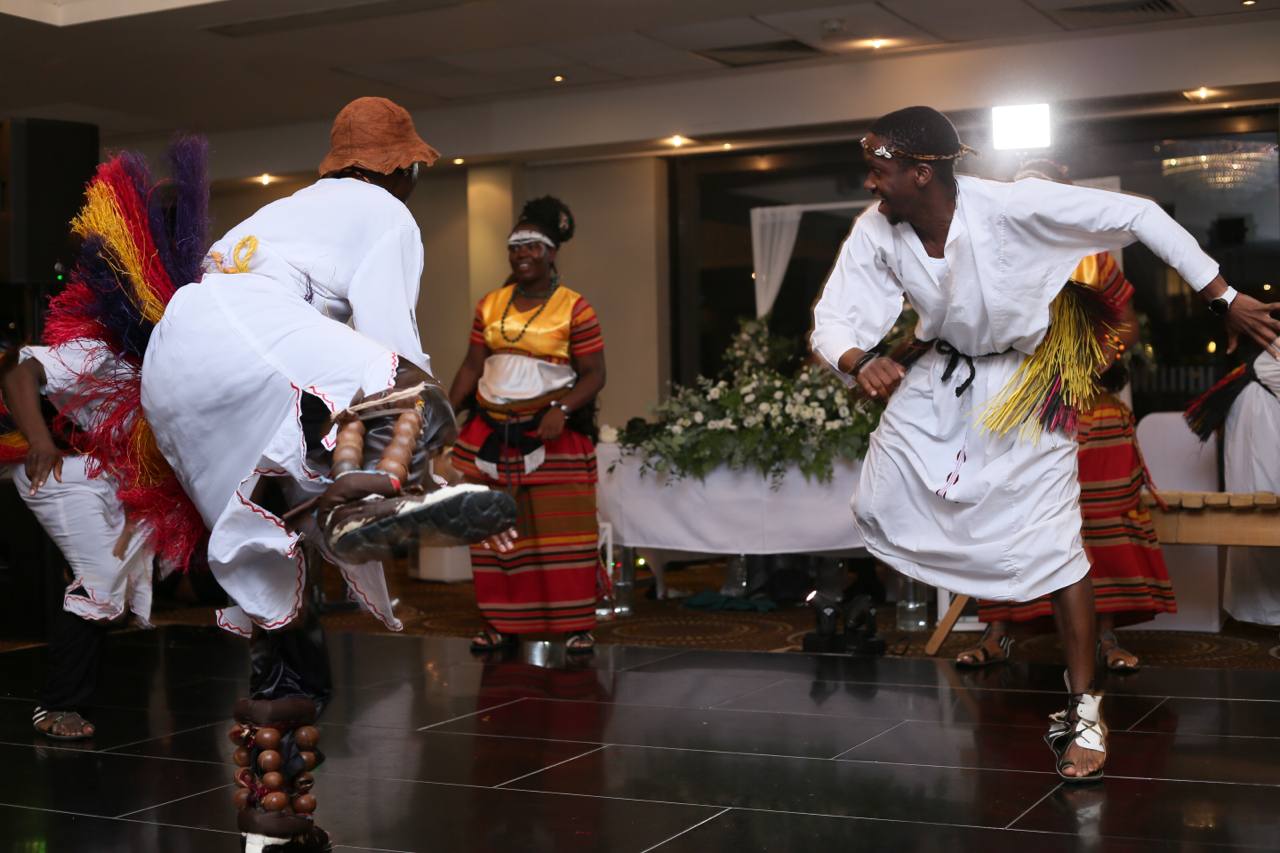 A group of people are dancing on a dance floor.