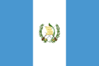 The flag of Guatemala: vertical light blue, white, and light blue bands with the national emblem centered on the white band.