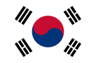The flag of South Korea features a white field, a central red and blue taegeuk, and four black trigrams in the corners.