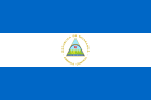 The national flag of Nicaragua: two horizontal blue bands separated by a white band with the country's emblem in the center.
