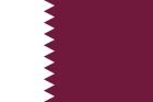 The national flag of Qatar: a vertical white band on the left with a serrated edge, and a larger maroon field on the right.